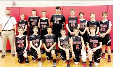  ?? RICK PECK/SPECIAL TO MC DONALD COUNTY PRESS ?? The McDonald County seventh-grade boys’ basketball team took second place in the Big 8 Conference tournament after dropping a 39-38 overtime decision to Lamar on Feb. 8 in Lamar. Team members include Braxton Spears (front, left), Eli Jordan, Kason...