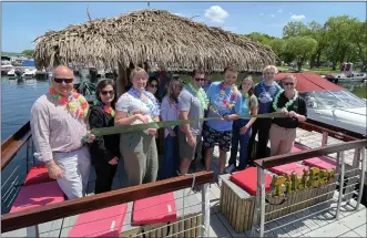  ?? SARATOGA COUNTY CHAMBER OF COMMERCE PHOTO ?? A ribbon-cutting ceremony was held to celebrate The Tiki Tours Saratoga Lake.