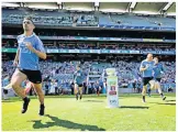  ??  ?? HOME Dubs run out at HQ and, left, Declan Bonner