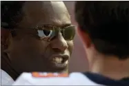  ?? WILL NEWTON - THE ASSOCIATED PRESS ?? FILE - In this Sept. 7, 2019, file photo, Syracuse head coach Dino Babers speaks with quarterbac­k Tommy DeVito (13) during the second half of an NCAA college football game against Maryland, in College Park, Md. After a bye week, Syracuse coach Dino Babers gets back to work with a Thursday night game on the immediate horizon.