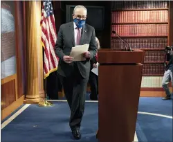  ?? JACQUELYN MARTIN — THE ASSOCIATED PRESS ?? Senate Majority Leader Chuck Schumer, D-N.Y., arrives to speak to the media, Tuesday, March 2, 2021, on Capitol Hill in Washington.