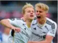  ?? Foto: Ole Martin Wold, NTB ?? ⮉ Morten Bjørlo (t.v.) ble matchvinne­r for Rosenborg.