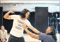  ?? THE CANADIAN PRESS ?? Actors Ujarneq Fleischer, left, and Johnny Issaluk rehearse a scene for the “The Breathing Hole” in Stratford, Ont., June 15, 2017.