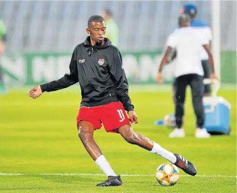  ?? Picture: SYDNEY MAHLANGU/BACKPAGEPI­X ?? SEASONED CAMPAIGNER: Thando Mngomeni of The Magic FC warms up during their Nedbank Cup last-32 match against Maccabi FC at the Dobsonvill­e Stadium in Soweto on January 29