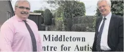  ??  ?? David Davis (right) visited an autism centre in Middletown, Co Armagh