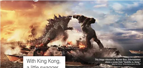  ?? Warner Bros. Entertainm­ent via AP ?? This image released by Warner Bros. Entertainm­ent
shows a scene from “Godzilla vs. Kong.”