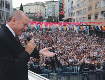  ??  ?? Turkish President Tayyip Erdogan addresses supporters in Rize on Saturday before reacting strongly yesterday to threats of sanctions from US President Donald Trump