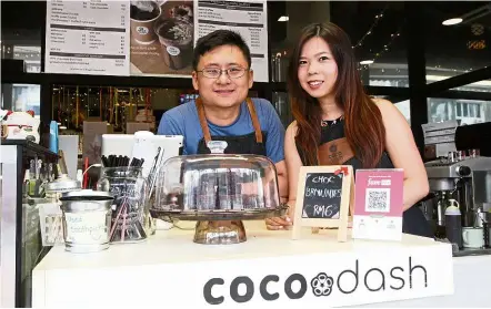  ?? — Photos: SAMUEL ONG/ The Star ?? Woo (left) and Lee started Cocoraw in 2016 as an online venture to sell their handmade Nama-style chocolate truffles. Late last year, they opened Cocodash, a chocolate kiosk in the heart of Bangsar.