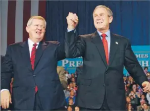  ?? Susan Walsh
Associated Press ?? CAMPAIGN TRAIL President George W. Bush appears at a rally for Janklow during his congressio­nal run in October 2002. Janklow won the seat, but he resigned after causing a fatal traffic accident.