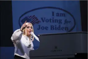  ?? ANDREW HARNIK ?? FILE - In this Nov. 2, 2020 file photo, Lady Gaga performs during a drive-in rally for then Democratic presidenti­al candidate former Vice President Joe Biden at Heinz Field in Pittsburgh. Lady Gaga will sign the national anthem at Joe Biden’s presidenti­al inaugurati­on on the West Front of the U.S. Capitol when Biden is sworn in as the nation’s 46th president next Wednesday.