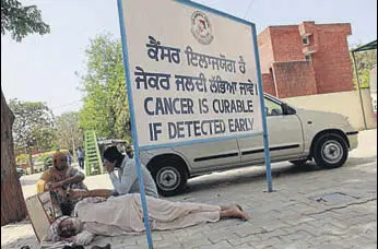  ?? HT FILE ?? Patients and their relatives awaiting their turn outside the Homi Bhabha Cancer Hospital in Sangrur. Of 22 districts, only Moga, Bathinda and Fazilka have kept a record of the number of deaths.