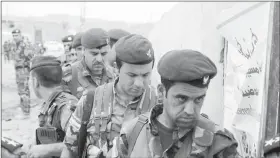  ??  ?? Les combattant­s peshmergas se préparent à une offensive de l’armée irakienne