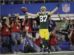  ?? ERIC GAY - THE ASSOCIATED PRESS ?? FILE - In this Feb. 6, 2011, file photo, Green Bay Packers’ Jordy Nelson celebrates after he scored a touchdown against the Pittsburgh Steelers during the first half of the NFL football Super Bowl XLV game in Arlington, Texas.