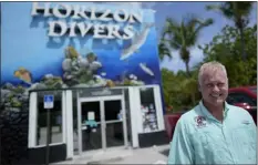  ?? AP PHOTO/REBECCA BLACKWELL ?? Dan Dawson, owner of Horizon Divers, poses outside his dive shop in Key Largo, Fla., Thursday, Aug. 17, 2023.