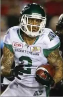  ?? CANADIAN PRESS FILE PHOTO ?? Saskatchew­an Roughrider­s’ Chad Owens, left, will be back in Toronto looking for a berth in the Grey Cup.