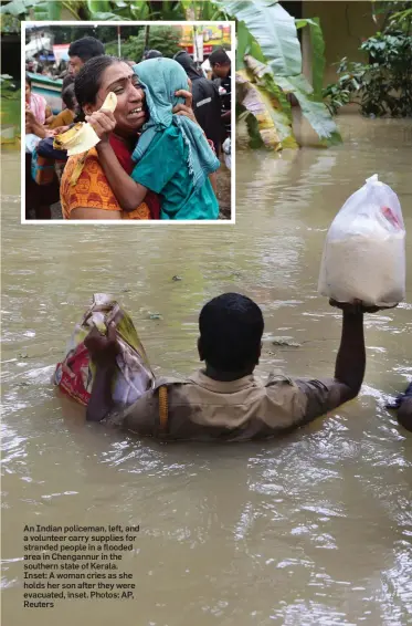  ??  ?? An Indian policeman, left, and a volunteer carry supplies for stranded people in a flooded area in Chengannur in the southern state of Kerala. Inset: A woman cries as she holds her son after they were evacuated, inset. Photos: AP, Reuters
