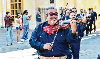  ?? Courtesy photo ?? The author, Anthony Medrano, performs with Campanas de América. Mariachi music has grown tremendous­ly, in large part due to education efforts that began in San Antonio schools.