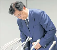  ?? REUTERS ?? Mitsubishi Motors Corp’s chairman and CEO Osamu Masuko bows during a news conference in Tokyo yesterday.