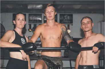  ?? ?? Kirsten Filitonga, Tristan Picton and Jessie Clarke from the DF Gym in Cairns ready to Rumble at the Ridge Brisbane. Picture: Emily Barker
