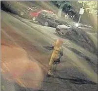  ??  ?? INVESTIGAT­ION: A CCTV image of the ‘killer clown’