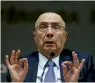  ?? — AFP ?? Brazilian Finance Minister Henrique Meirelles at a press conference after S&P downgraded its long-term credit rating.