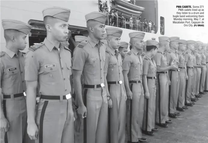  ?? (PJ ORIAS) ?? PMA CADETS. Some 271 PMA cadets lined up as they listen to a drum and bugle band welcoming them Monday morning, May 7, at Macabalan Port, Cagayan de Oro City.