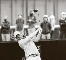  ?? Harry How / Getty Images ?? England’s Paul Casey, driving from No. 13 on Sunday, finished with a final-round 66 and tied with Dustin Johnson for second at 11-under.