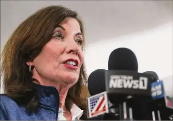  ?? Photos by Joshua Bessex / Associated Press ?? Gov. Kathy Hochul speaks at a news conference after the shooting at a Buffalo supermarke­t.