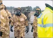  ?? Cpl. Pete Brown British Ministry of Defense ?? SOLDIERS and forensic experts descended on Salisbury, England, to aid with decontamin­ation efforts.