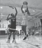  ?? SPECIAL TO THE POST ?? Jupiter Christian’s Collin Paul goes up for a layup in the Eagles’ regional quarterfin­als win over Miami Christian on Feb. 16.