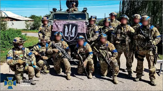  ?? ?? VICTORIOUS: Ukrainian troops in the recaptured town of Kupiansk in a picture released yesterday. Left: Gains made in the counter-offensive