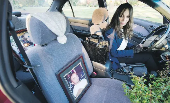  ?? GERRY KAHRMANN ?? Eileen Mohan travels with photos of her son Christophe­r in her car. People tell her she should move on 10 years after his murder, but “it is so damn difficult.”