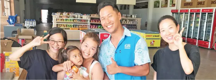  ?? Photo: Charles Chambers ?? From left: Grace Road Group staff Hanna Jim, welcome their first customer Yoki Salvin and baby Shanaya Salvin with Grace Road Group president Daniel Kim and Ana Choi at the newly opened Grace Road Group’s complex at Nawaicoba, Nadi.
