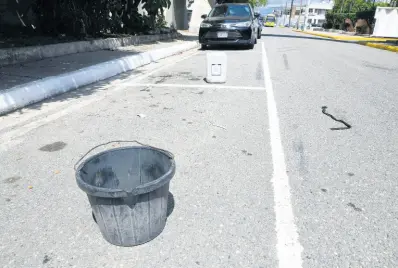  ?? RUDOLPH BROWN/PHOTOGRAPH­ER ?? Blocked parking spaces seen on Church Street adjacent to the Jamaica Conference Centre in downtown Kingston, where motorists are being charged to park almost daily by unauthoris­ed individual­s.