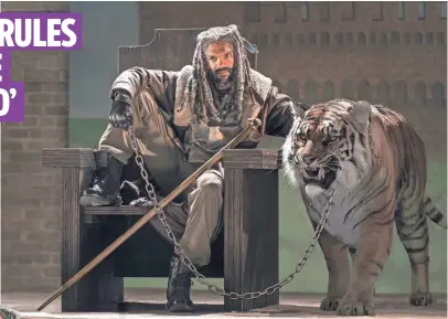  ?? PHOTOS BY GENE PAGE, AMC ?? King Ezekiel (Khary Payton) rules The Kingdom with the help of his tiger, Shiva, on AMC’s The Walking Dead.