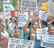  ?? ANI ARCHIVE ?? People protest against Unnao rape case, outside Uttar Pradesh Bhawan in New Delhi on July 30, 2018.