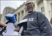  ?? (AP/Kevin McGill) ?? Raymond Flanks talks to reporters outside the New Orleans criminal courthouse on Thursday.