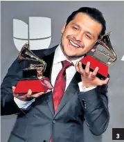  ??  ?? 3
2 II DÚO. El mexicano lanzó hace poco el tema
La Mitad junto con Camilo Echeverry, un artista que es completo y romántico.
3 II LOGRO.
Es uno de los latinos más jóvenes en ganar un Latin Grammy, ahora posee un total de 5 preseas.