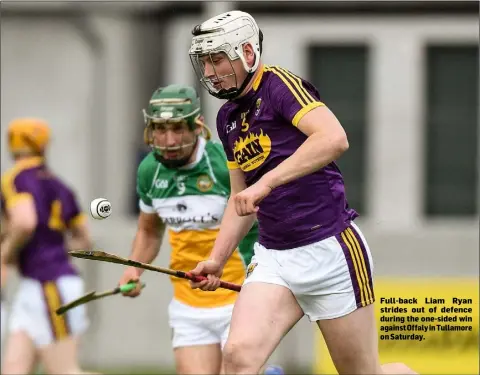  ??  ?? Full-back Liam Ryan strides out of defence during the one-sided win against Offaly in Tullamore on Saturday.