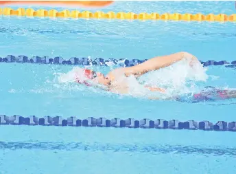  ?? SKIPPY LUMAWAG/SDD-CMO ?? BOUNCING BACK. Team Mindanao-Philippine­s’ Elson Jake Rodriguez who settles for the 10th BIMPNT-Eaga Friendship Games 2018 men’s 100-meter backstroke bronze medal Thursday morning, recovered to clinch the 50m backstroke gold in the afternoon.