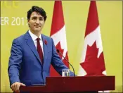  ?? MARK SCHIEFELBE­IN / ASSOCIATED PRESS ?? Canadian Prime Minister Justin Trudeau speaks at a news conference held on the sidelines of the AsiaPacifi­c Economic Cooperatio­n (APEC) forum in Danang, Vietnam, on Saturday.