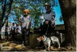  ?? ?? This photo shows participan­ts and their dogs taking part in a search and rescue program in Taguig, metro Manila.