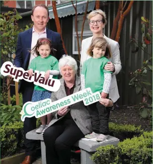  ??  ?? Pictured at the launch of Coeliac Awareness Week 2018 was Paddy Curran, SuperValu’s Health & Wellness Manager, Rose and Martha Killion, aged 4 from Sandymount, Dublin, with Minister of State at the Department of Health, Catherine Byrne TD and Aileen...