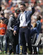  ?? TONY AVELAR — THE ASSOCIATED PRESS ?? Former San Francisco Giants catcher Buster Posey waves to the crowd Saturday in San Francisco.