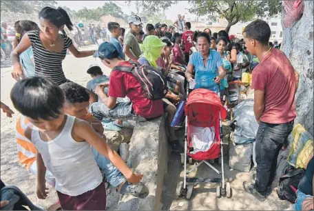  ?? Luis Robayo AFP/Getty Images ?? VENEZUELAN­S at a shelter in Villa del Rosario, Colombia. More than 3 million are believed to have f led Venezuela in recent years.