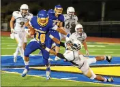  ?? CHRIS RILEY — TIMES-HERALD ?? Benicia’s Maurian Burrell straight-arms Berean Christian’s Justice Jackson on his way to a 59-yard touchdown during the Panthers’ 41-20 win in 2018.