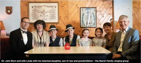  ?? ?? Sir John Burn and wife Linda with his talented daughter, son-in-law and grandchild­ren – the Marsh Family singing group