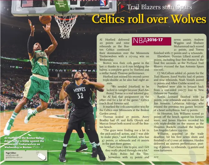  ?? Photo: IC ?? Al Horford of the Boston Celtics drives in for a layup against the Minnesota Timberwolv­es on Wednesday in Boston.