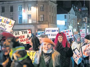  ?? ?? SOLIDARITY: Marchers demonstrat­e over gender-based violence against women.