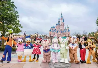  ??  ?? Below, Shanghai Disneyland Park, located just oppositeth­e Meliá Shanghai Parkside hotel, and oneof the hotel’s suites.